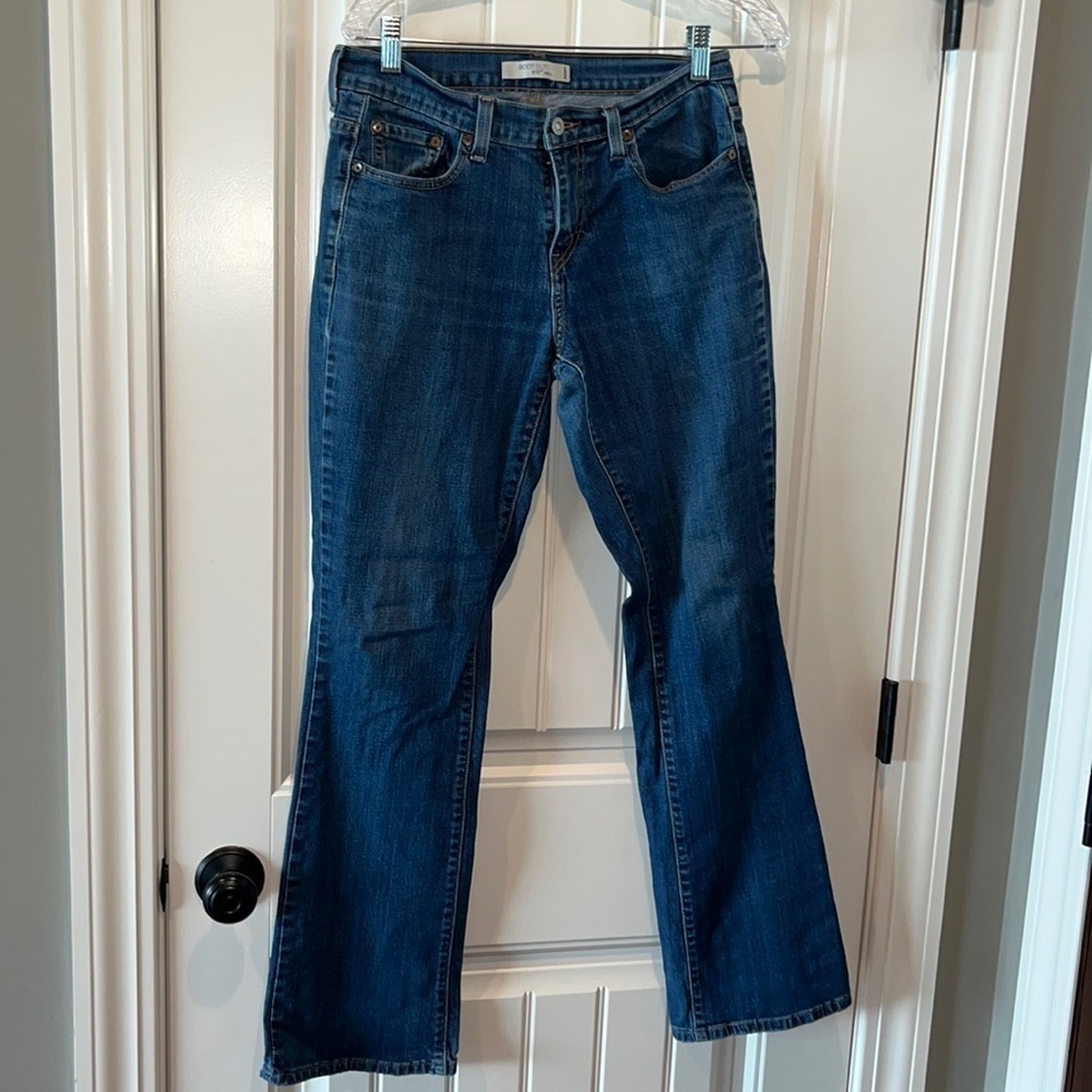 Levi’s 515 bootcut with rare R tag medium wash size 6 Long - Picture 1 of 13
